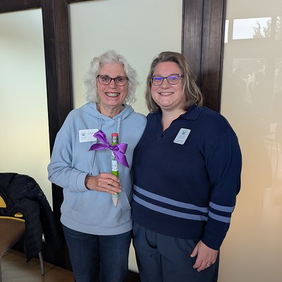 2025 Outstanding Volunteer Award winner Lezlie Matsuyama with Katie McGee, the Land Trust's Development Associate.