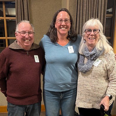 Dick and Kathy Malone with Sarah Mowry at the 2024 Volunteer Recognition event. Photo: Land Trust.
